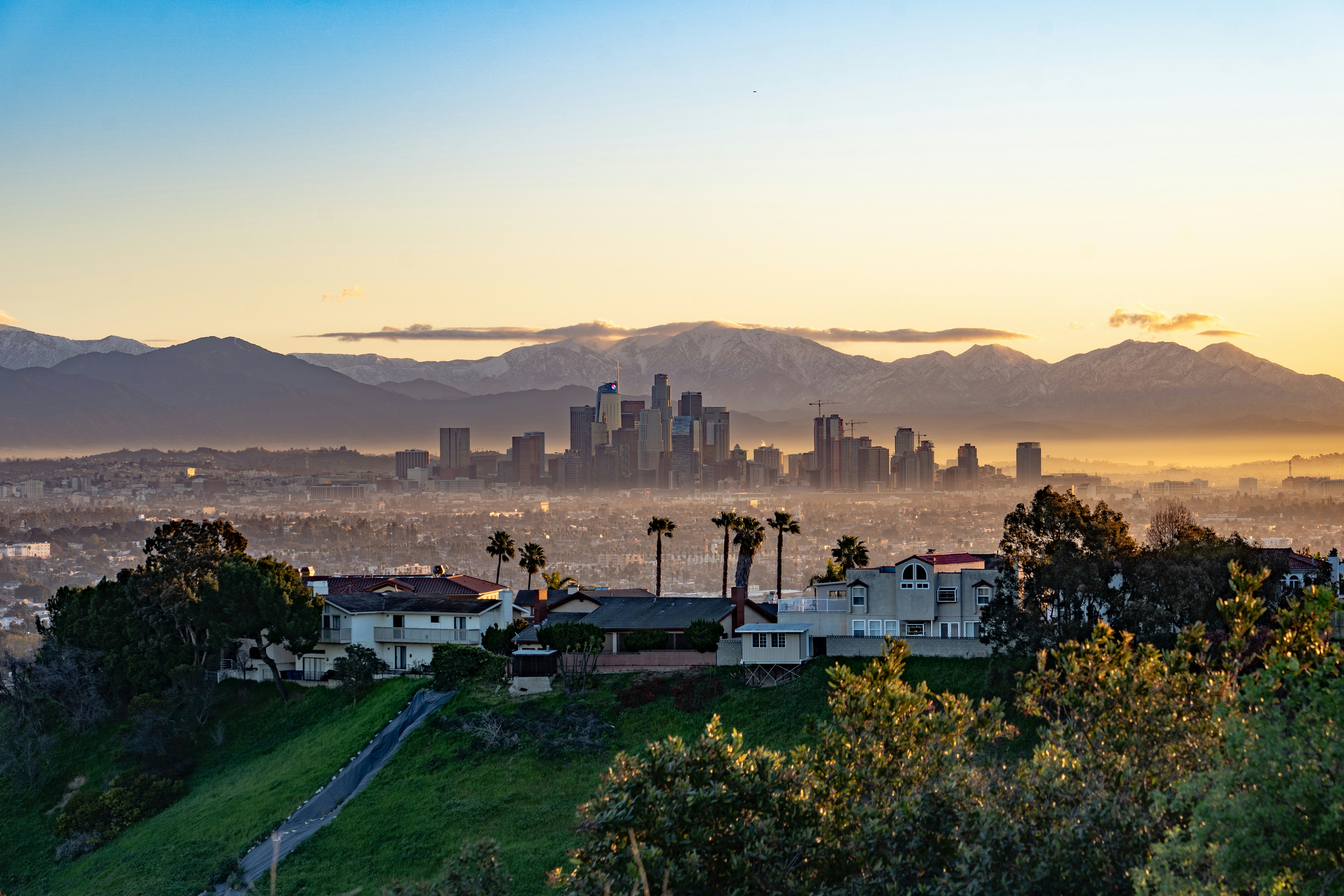 Aerial view of a California neighborhood near the coast, representing dual beach and ski college access